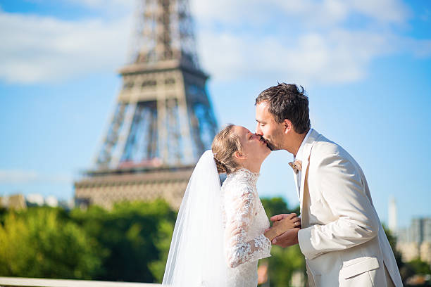 istock Bride and groom in Paris, near the Eiffel tower 521619405