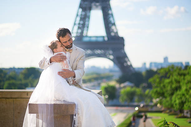 istock Bride and groom in Paris, near the Eiffel tower 521619415