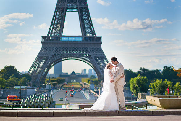 istock Bride and groom in Paris, near the Eiffel tower 521619421