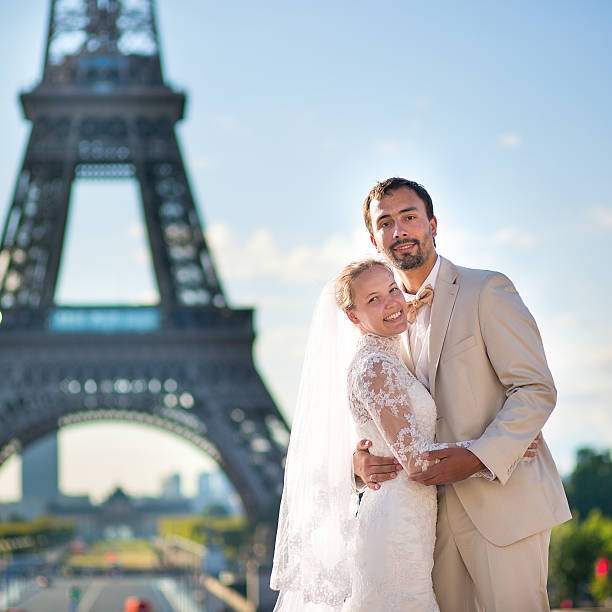istock Bride and groom in Paris, near the Eiffel tower 521619425