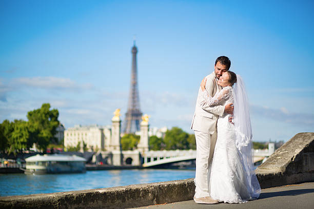 istock Beautiful just married couple in Paris 521619435
