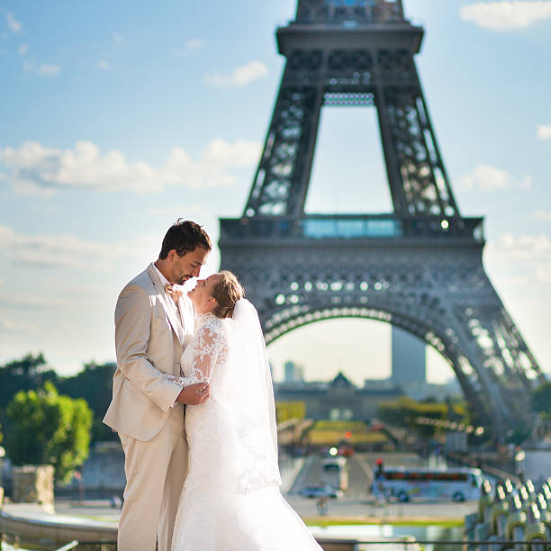 istock Beautiful just married couple in Paris 521619939