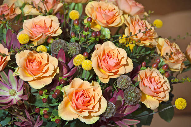 Bouquet with orange roses in vase