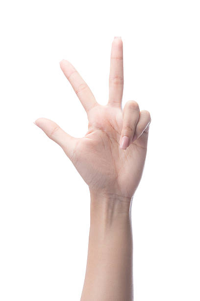 istock Counting woman hands three, number 3 521622354