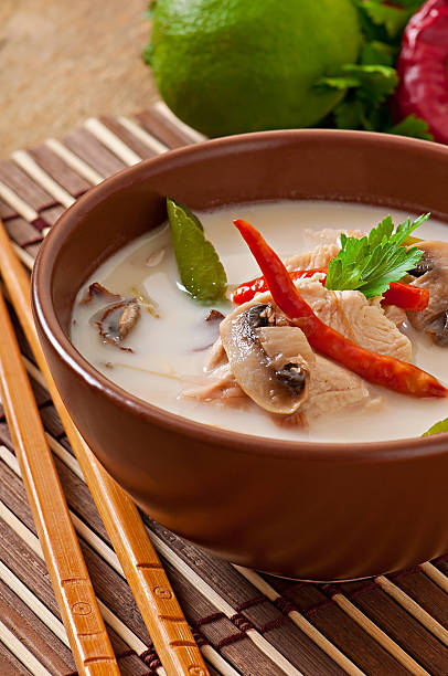 istock Thai soup with chicken and mushrooms 521622737