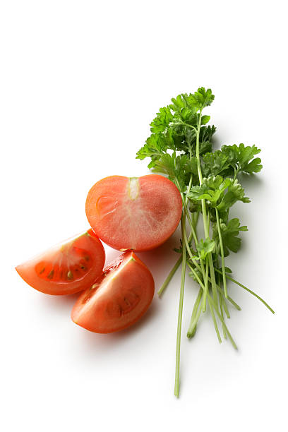 istock Ingredients: Tomato and Parsley Isolated on White Background 521623390