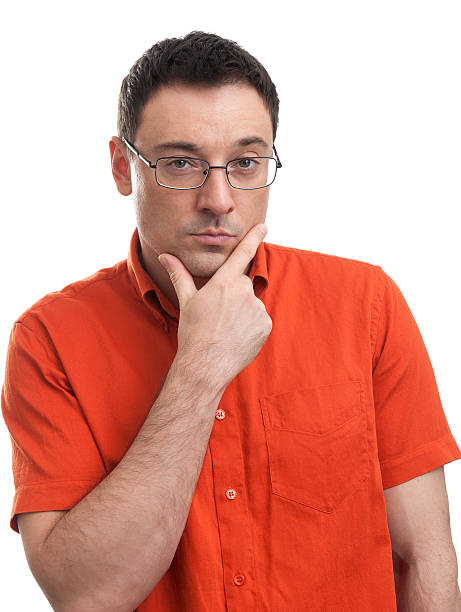 istock young thinking man with hand near face 521623719