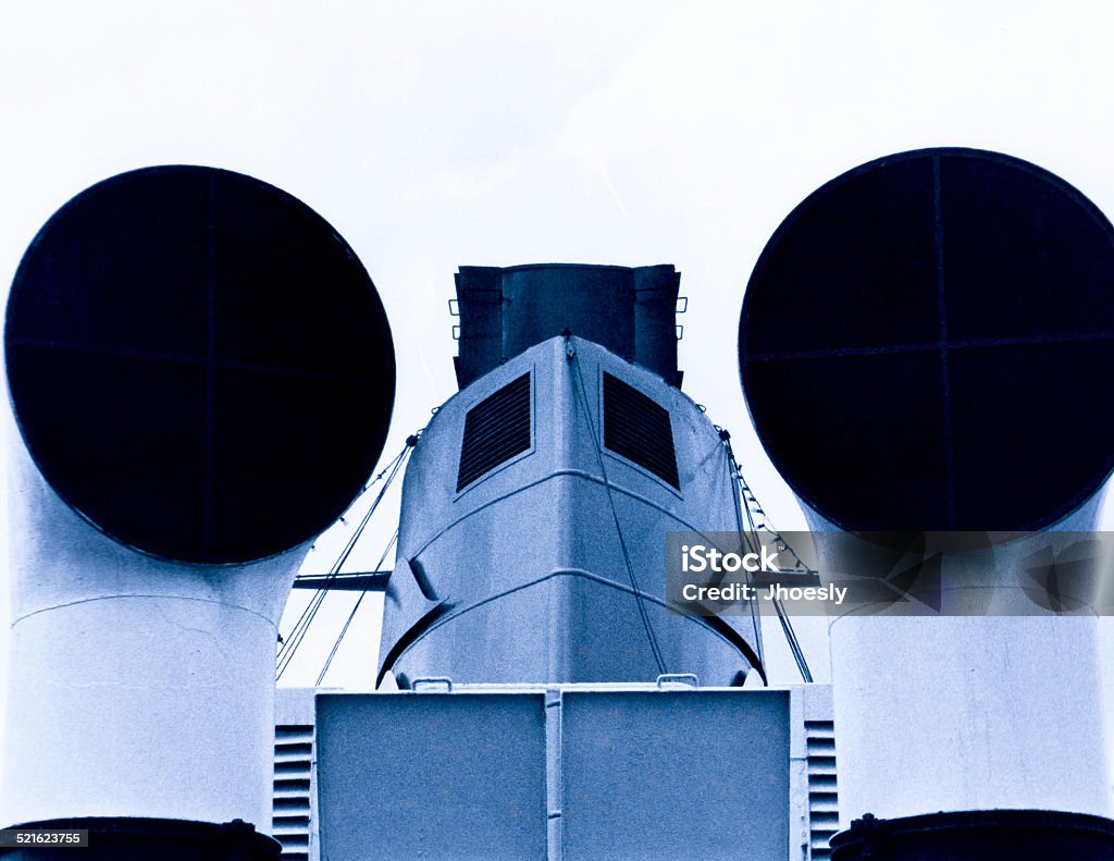 Ship Vents Two large ship vents or funnels in a symmetrical arrangement. 1970-1979 Stock Photo