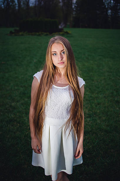 Portrait of a young woman outdoors