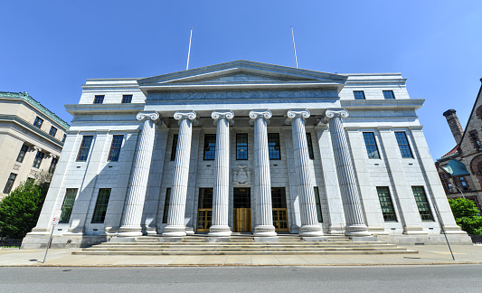 Boston, Massachusetts, USA - August 19, 2023: Entrance to the Baker Library on the Harvard Business School (HBS) campus. Dedicated in 1927 and named for George F. Baker, the benefactor who funded HBS's original campus. It is the largest business library in the world.