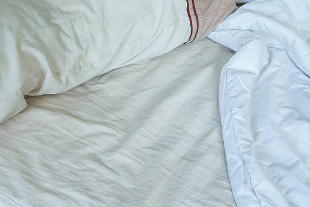 istock Bed in Morning Sheet and Pillow 521624886