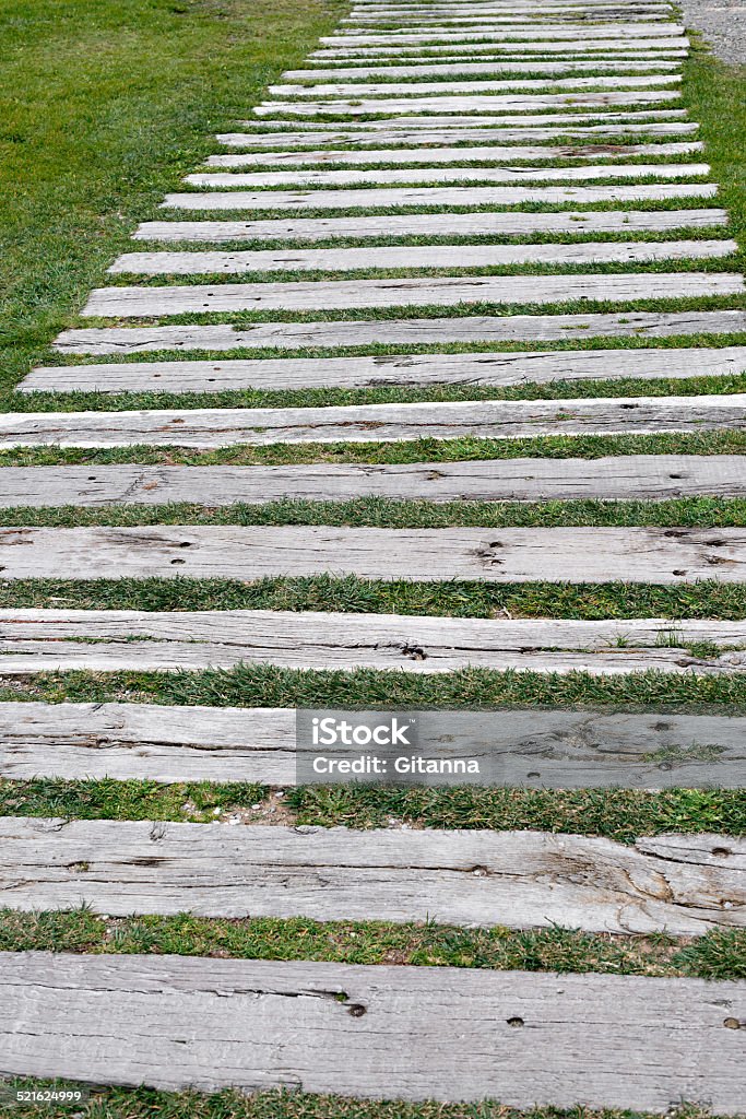 garden wooden sleepers Detail of a garden path of wooden sleepers Backgrounds Stock Photo