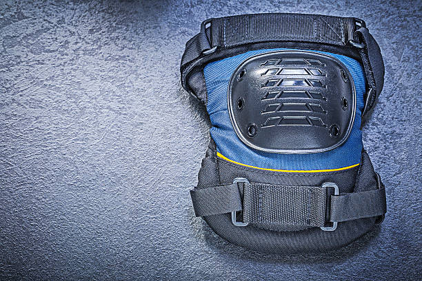 istock Knee protectors on black background construction concept 521625592