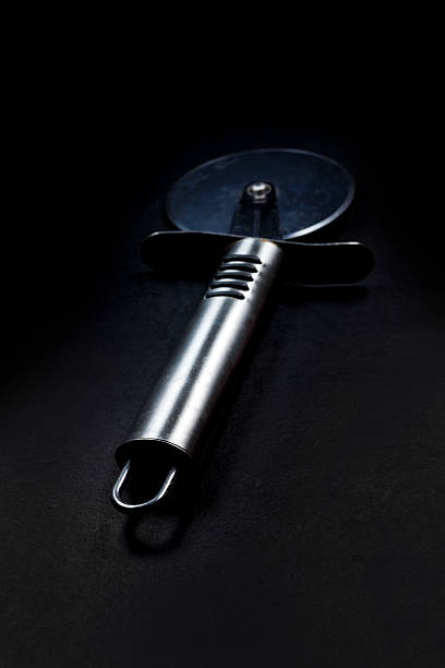 istock Stainless steel pizza cutter 521625647