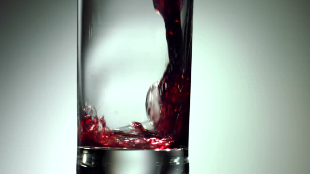 wine, grape juice is poured into a glass