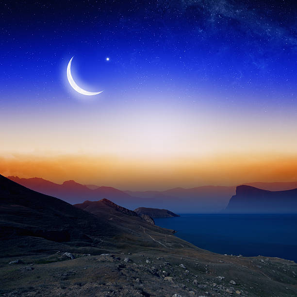 istock Moon, stars and moutains 521662289