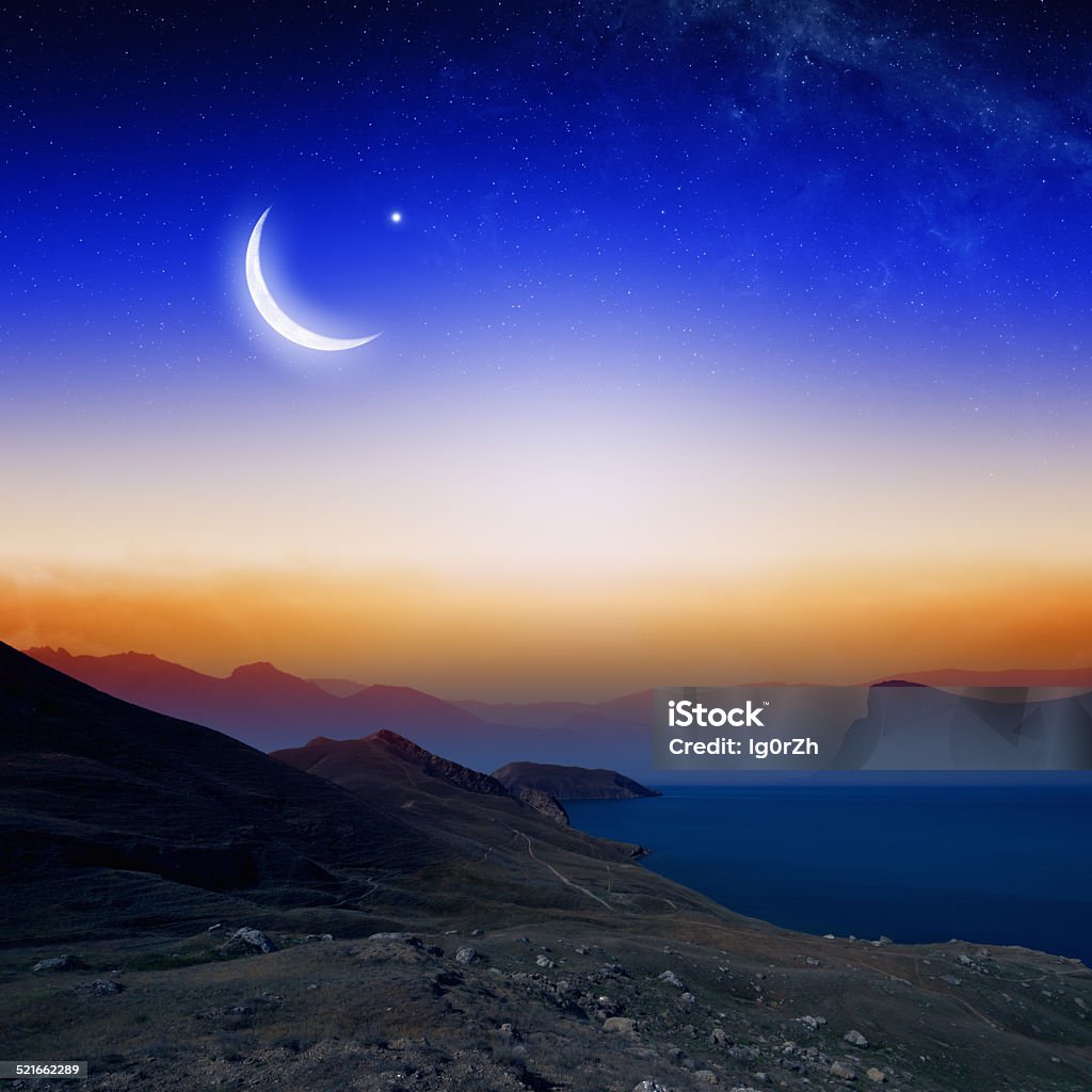 Moon, stars and moutains Islamic background with moon and stars, holy month, Ramadan Kareem, mountain silhouettes. Elements of this image furnished by NASA Moon Stock Photo