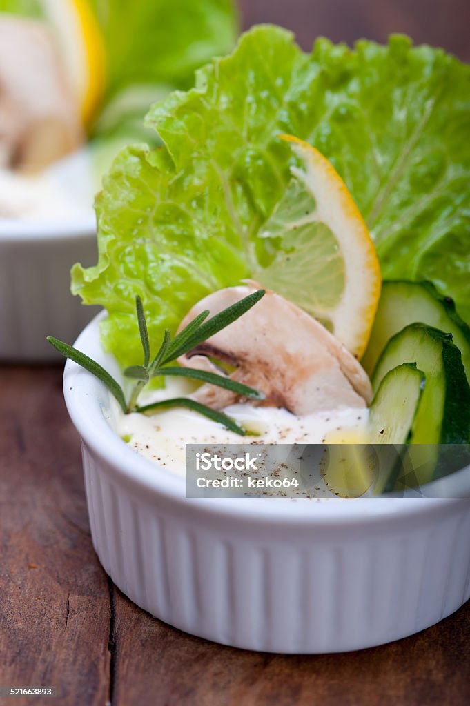 fresh garlic cheese dip salad fresh organic garlic cheese dip salad on a rustic table Appetizer Stock Photo