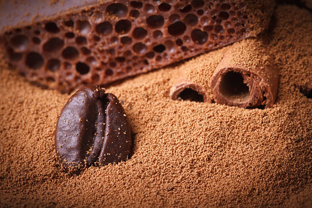 istock Coffee bean close-up in the ground coffee. macro texture 521663949
