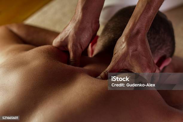 Deep Tissue Massage Stock Photo - Download Image Now - Massaging, Deep, Men