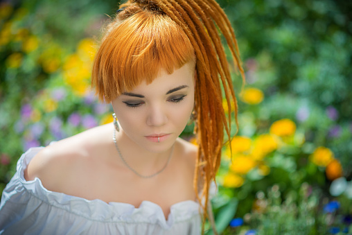 


Portrait of a beautiful asian woman, outdoor. Selective focus with shallow depth of field.