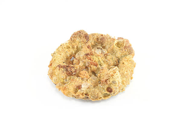 istock Cake wheel Thai dessert , Khanom Kong, isolate on white 521667891