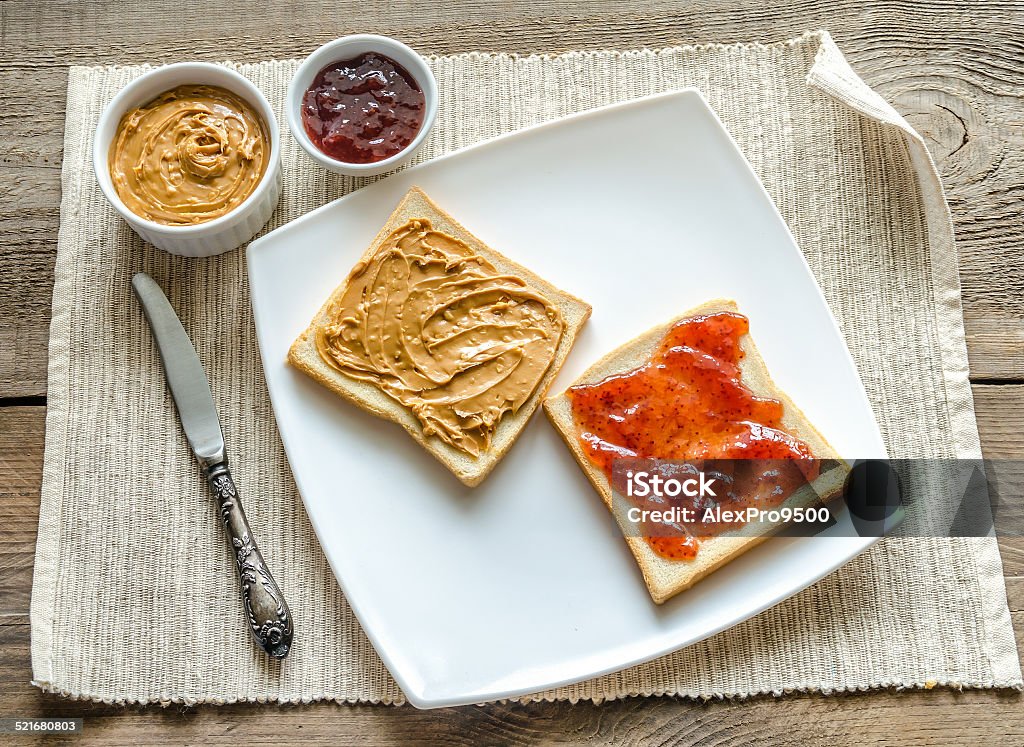 Sandwiches with peanut butter and strawberry jelly Peanut Butter Stock Photo