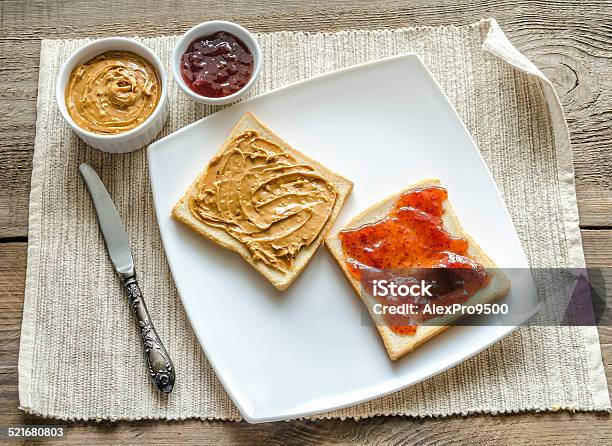 Sandwiches With Peanut Butter And Strawberry Jelly Stock Photo - Download Image Now - Peanut Butter, Crunchy, Toasted Bread