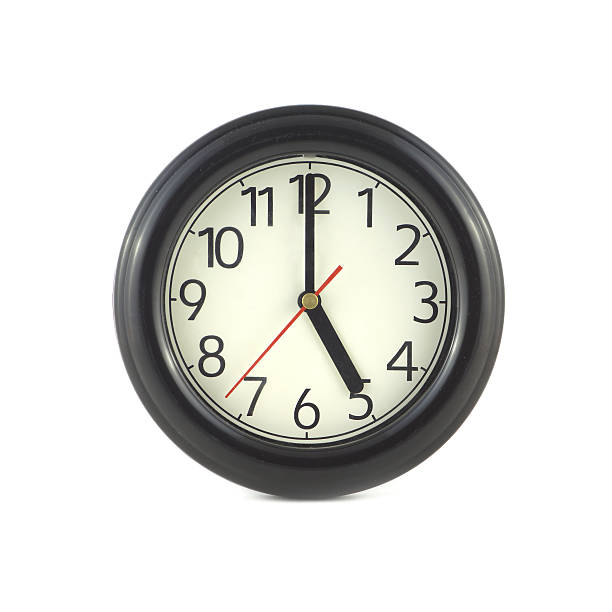 istock Big round wall clock isolated on white close up 521681675