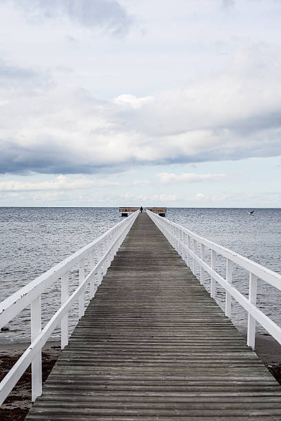 istock old wooden jetty at a sea 521683211
