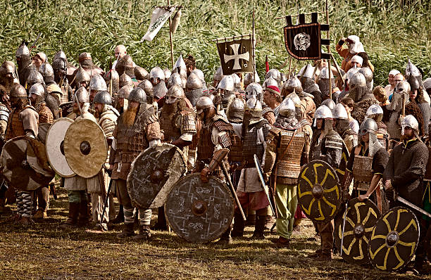 sword and round metal shield  on dark background
