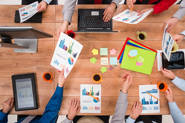 istock Business team analyzing financial data on a meeting 521683447