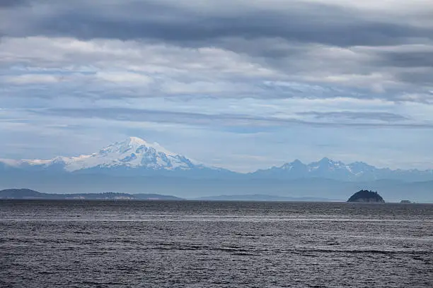 Mount Baker part of the north cascade mountains in Washington state as seen from Pender Island,BC.