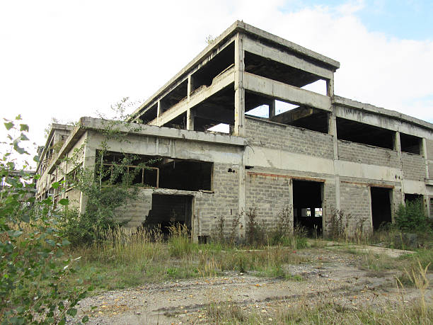 istock Buildings of old broken and abandoned industries - 3 521684428