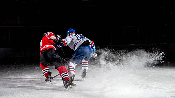istock Men playing ice hockey 521686730