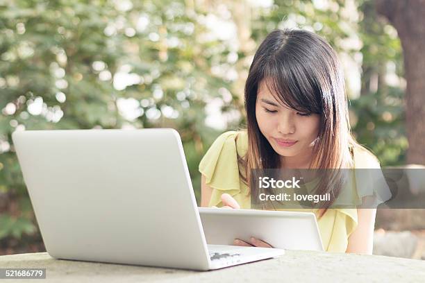 Portrait Of Asian Female Student With Laptop In Campus Stock Photo - Download Image Now