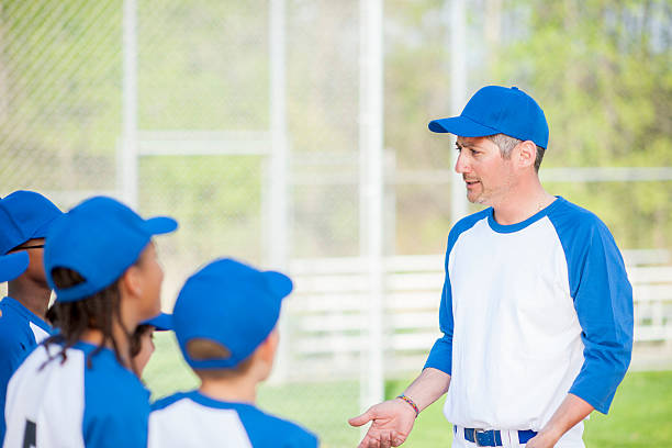 istock Coach Giving the Team a Pep Talk 521688040