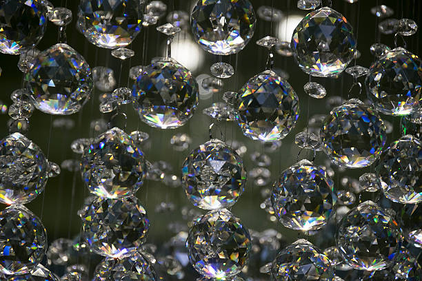 istock Diamond crystal glass ball bright abstract background 521688444