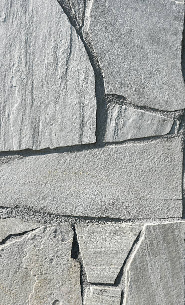 istock Natural white gray pavement stone for floor, wall or path. 521689062