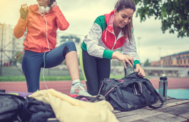istock Two young women preparing for jogging outdoors 521691110