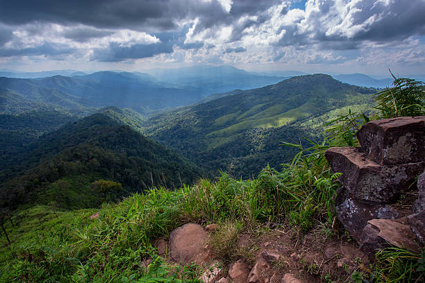 istock Sun rays bursting through the clouds with beautiful mountain vie 521691776