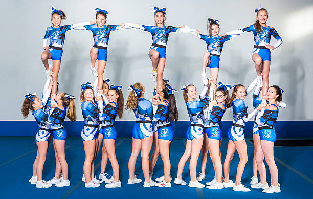 istock Portrait of beautiful cheerleaders 521692880