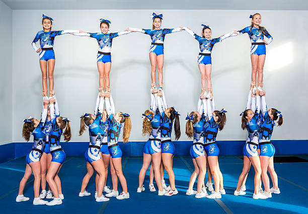 istock Portrait of beautiful cheerleaders 521692944