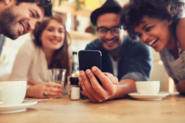 istock Sharing old memories on smart phone 521693182