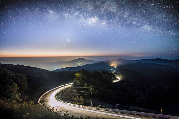 istock Milky Way Galaxy with lighting on the road 521693684