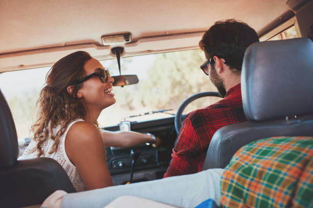 istock Young couple enjoying a road trip 521694156