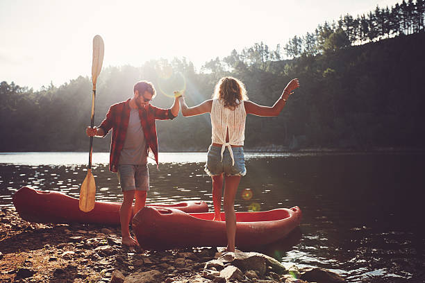istock Couple going for a canoe ride in the lake. 521694500