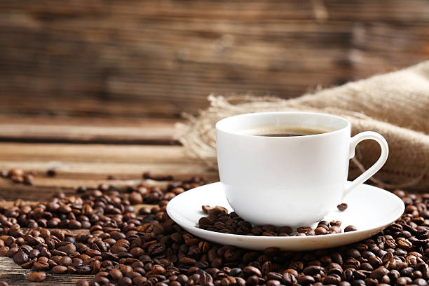 istock Cup of coffee with coffee beans 521697030
