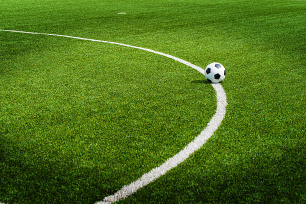 istock Soccer ball on field 521697511