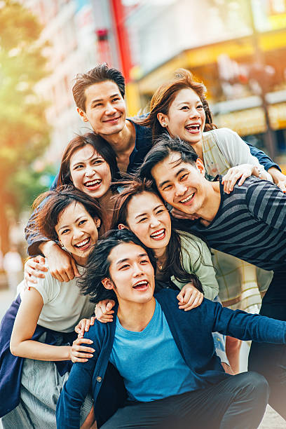 istock Group of people gathered for a selfie 521697874